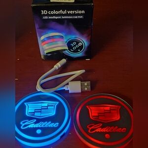 2 Cadillac Led Color Changing USB charged Car Cupholder Coasters.